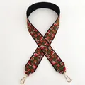 Detail of ethnic embroidery strap with red floral patterns and gold lobster clasps - Style 6