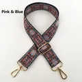 Detail view of pink and blue embroidered floral strap with golden metal lobster clasps - Pink Blue