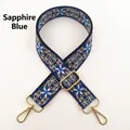 Detail of royal blue ethnic embroidered bag strap with golden metal swivel hooks - Sapphire Blue