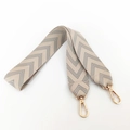 Close-up of woven herringbone bag strap with high-quality gold metal lobster clasps - Gray Blue