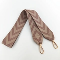 Detail view of wide embroidered V-pattern canvas strap with rose gold lobster clasps - Nude Pink