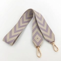 Close-up of purple and beige geometric woven bag strap with rose gold metal swivels - Light Purple