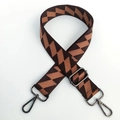 Detail of adjustable woven shoulder strap with brown zigzag pattern and gunmetal hooks - Coffee Strap Gunmetal Buckle