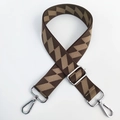 Macro shot of brown and beige geometric woven shoulder strap with silver metal hooks - Dark Green with Silver Buckle