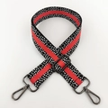 Detail eines 3,8cm breiten Nylon-Taschenriemens mit roten Streifen und schwarzen Haken - Schwarz und Orange Mit Gunmetal-Schnalle
