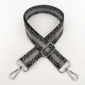Close-up of 3.8cm wide replacement strap with speckled pattern and silver metal buckles - Black Grey Silver Buckle