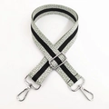 Detail of adjustable 3.8cm wide bag strap with grey spotted texture and silver metal clips - Green Silver Buckle