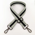 Detail of light green spotted fabric bag strap with gunmetal gray lobster clasps - Green Gunmetal Buckle