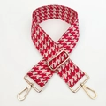 Dettaglio della tracolla jacquard pied-de-poule rossa e beige con fibbie regolabili - Rosso