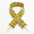 Dettaglio tracolla regolabile con stampa leopardata e ganci in metallo dorato lucido - Giallo e Verde