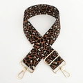 Close-up of leopard print jacquard bag strap with adjustable gold hardware and metal hooks - Dark Brown & Black
