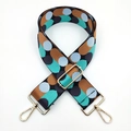 Detailed view of adjustable crossbody bag strap with colorful polka dots and gold hardware - Black Brown Green