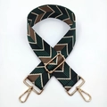Detail of adjustable woven bag strap with green geometric pattern and gold metal hooks - Green Khaki