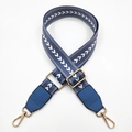 Detail of blue and white V-pattern nylon strap with gold metal hooks and leather ends - Lake Blue