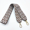Close-up of wide jacquard bag strap with silver peacock embroidery and gold hooks - Light Purple
