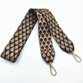 Detail of vintage jacquard bag strap with golden peacock pattern and metal lobster clasps - Black Gold Thread