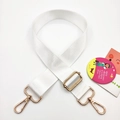 Detail of white nylon wide shoulder strap with adjustable golden metal buckle and lobster clasp - White