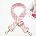 Close-up of pink and white geometric embroidered wide strap with golden metal clasps - White Pink