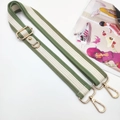 Detail of adjustable green and white striped canvas strap with golden metal clasps - Green Strap Only