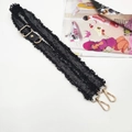 Detail of black wide fabric strap with silver stripes, fringe edges and gold metal hooks - Black Strap Only