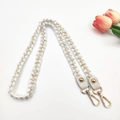 Detail of woven bag strap with white pearls and gold lobster clasp decoration - White / 100cm