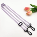 Detail of adjustable purple and white striped bag strap with durable black plastic swivel hooks - Light Purple + Black Buckle