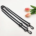 Detail of adjustable black and white striped canvas strap with plastic swivel hooks - Black with Black Hook