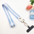 Detail of blue striped polyester wrist lanyard with gold lobster clasp and phone patch - Long Light Blue (With Phone Patch)