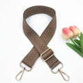 Close-up of brown chevron pattern woven strap with light gold metal swivel hooks - Gold Buckle / Dark Khaki