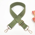 Close-up of military green woven strap with chevron pattern and gold hardware - Gold Buckle / Bean Green