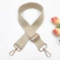 Adjustable beige woven bag strap with chevron pattern and gold metal hardware - Beige