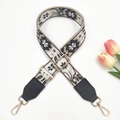 Detailed embroidery on woven wide shoulder strap with golden metal buckles and floral pattern - Gold Buckle / Beige Base Black