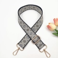 Detail of 3.8cm wide jacquard strap with geometric pattern and gold lobster claws - Black with Off-white