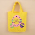 Süße gelbe Ostergeschenktasche aus Filz mit bunten Eier-Applikationen und Blumen - Gelbe Sonnenblume Osterei Stil