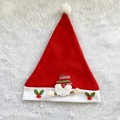Detail view of Santa hat with 3D plush character, holly leaves and fuzzy ball - Adult Santa Claus