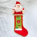 Detail of red Christmas stocking with Santa figure and pockets for small gifts - Snowman Style