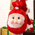 Red velvet Santa gift bag with plush 3D face and drawstring closure for Christmas - Santa Claus / Red