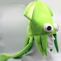 Vue détaillée du bonnet pieuvre vert vif avec tentacules et grands yeux de dessin animé - Chapeau de Poulpe Vert