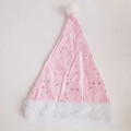 Detail of pink velvet Christmas hat with silver glitter stars and white faux fur trim - Pink Star Style