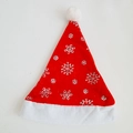 Detail of red plush Christmas hat with silver glitter snowflakes and white faux fur trim - Red Brushed Snowflake Style