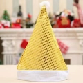 Golden sequin Christmas hat with white plush trim shown in festive holiday background - Gold / Kids