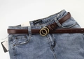 Close-up of retro dark brown leather thin belt with bronze double ring buckle on jeans - Coffee (Antique Bronze Buckle)