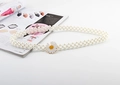 Detail of double-strand pearl belt featuring a white daisy flower buckle for dresses - Daisy Gold Buckle Pearl Belt