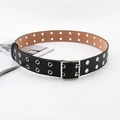 Detail view of punk double-row metal eyelets and black leather strap for denim jeans - Black Double Row Eyelet