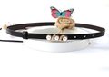 Close-up of slim black PU leather belt with elegant pearl and rhinestone buckle - 3 Pearls Wave Rhinestone / Black