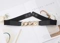 Detail of black elastic corset belt with a large gold chain buckle on magazine background - 3CM Chain Elastic (Gold)