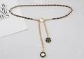 Close-up of golden metal chain interwoven with black leather and camellia pendants - Gold With Black Woven (Round Pearl)