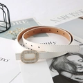 Elegant white skinny leather belt for women with gold rhinestone oval buckle on magazines - White