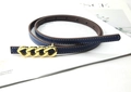 Detail of navy blue cross-grain leather belt featuring a golden triple ring chain buckle - Navy Blue