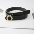 Minimalist black thin leather belt for women featuring a golden flower alloy buckle - Black